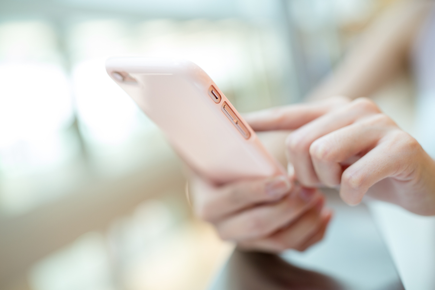 Woman Looking at Smart Phone
